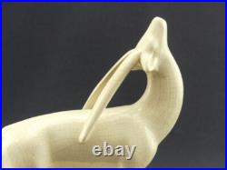 Onnaing, paire de serre-livres antilopes en craquelé Art Déco Onnaing, paire de serre-livres antilopes en craquelé Art Déco