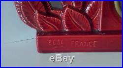 Pendule en céramique rouge Art déco Charles Lemanceau couple perruche St Clément