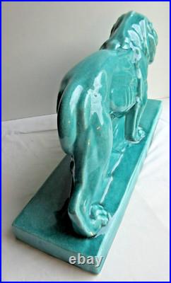 Sculpture Art Déco, céramique craquelée bleu-céladon Lion Peugeot sur terrasse
