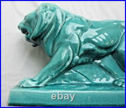 Sculpture Art Déco, céramique craquelée bleu-céladon Lion Peugeot sur terrasse