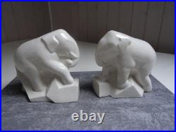 Serre- livres, art déco, éléphants trompe enroulée, céramique craquelée ivoire