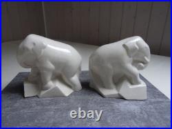 Serre- livres, art déco, éléphants trompe enroulée, céramique craquelée ivoire