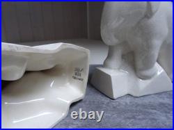 Serre- livres, art déco, éléphants trompe enroulée, céramique craquelée ivoire