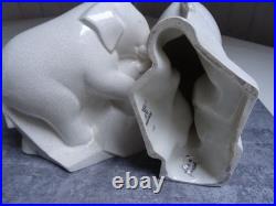 Serre- livres, art déco, éléphants trompe enroulée, céramique craquelée ivoire