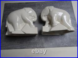 Serre- livres, art déco, éléphants trompe enroulée, céramique craquelée ivoire