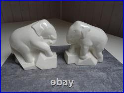 Serre- livres, art déco, éléphants trompe enroulée, céramique craquelée ivoire