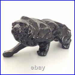 Statue animalière en céramique émaillée noir lion de Saint Clément Art Déco