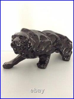 Statue animalière en céramique émaillée noir lion de Saint Clément Art Déco