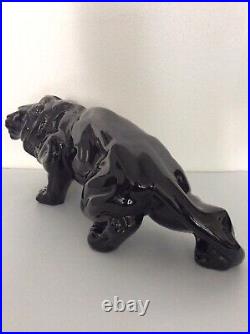 Statue animalière en céramique émaillée noir lion de Saint Clément Art Déco