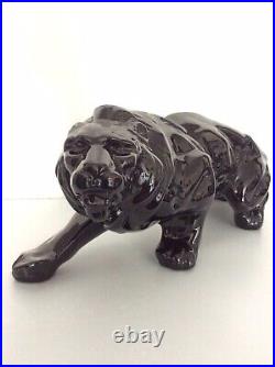 Statue animalière en céramique émaillée noir lion de Saint Clément Art Déco