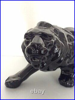 Statue animalière en céramique émaillée noir lion de Saint Clément Art Déco