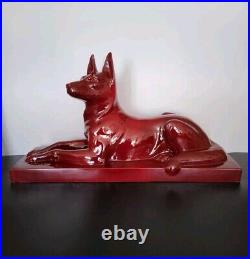 Statue chien berger allemand en céramique émaillée rouge Saint Clément Art Déco